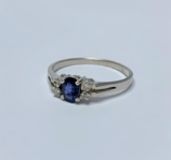 Oval Sapphire and 4xCZ Sterling Silver Ring