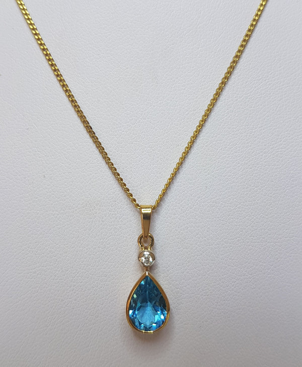 Blue Topaz and Diamond Bezel Set Pear 9ct YG Pendant