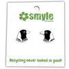 Penguin-shaped earrings on a Smyle Designs card with recycling theme.