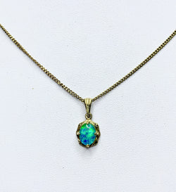 9ct Yellow Gold Oval Opal Pendant With Engraved Setting