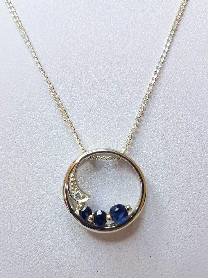 Three Sapphires Set in a Circle Sterling Silver Pendant With Cubic Zirconia
