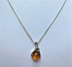Round Amber Sterling Silver Pendant