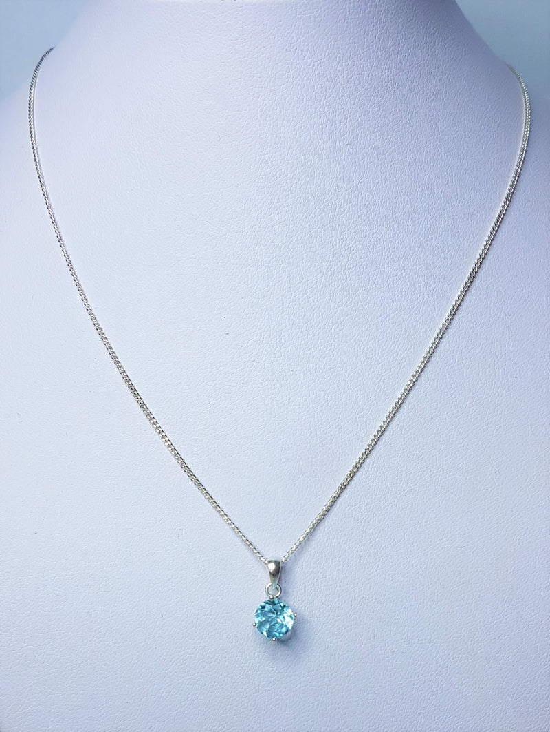 7mm Round Blue Topaz Claw Sterling Silver Pendant