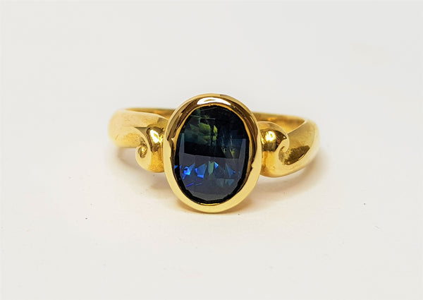 9ct Yellow Gold Oval Sapphire Swirl Ring